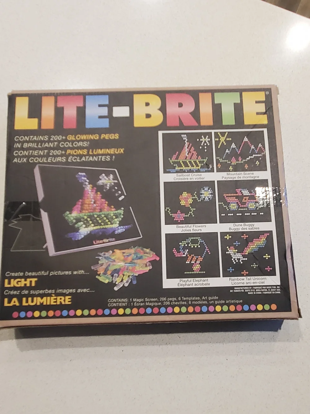 Like new, in box. Mini Lite Brite